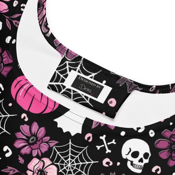 Pink Halloween-themed skater dress by Printful made from recycled fabric, featuring an all-over spooky print.