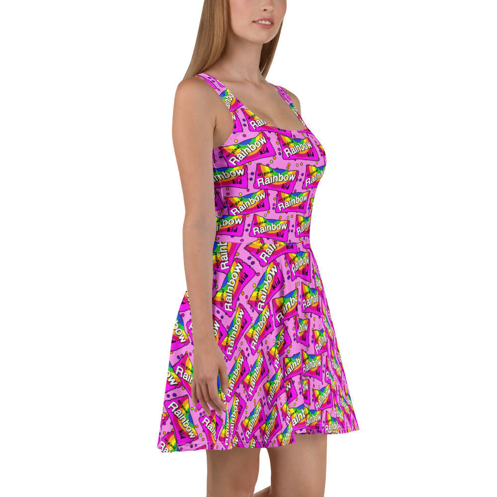 Recycled rainbow-colored skater dress by Designed By Debz with vibrant all-over print on white fabric.