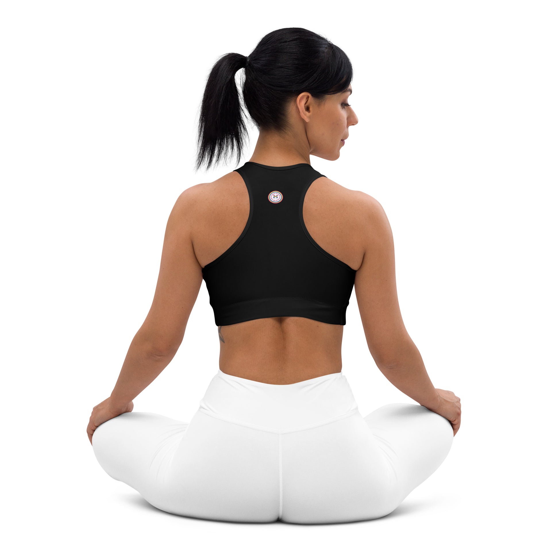 Black all-over-print sports bra by Printful featuring Debz logo, shown from the back in size XS to 2XL.