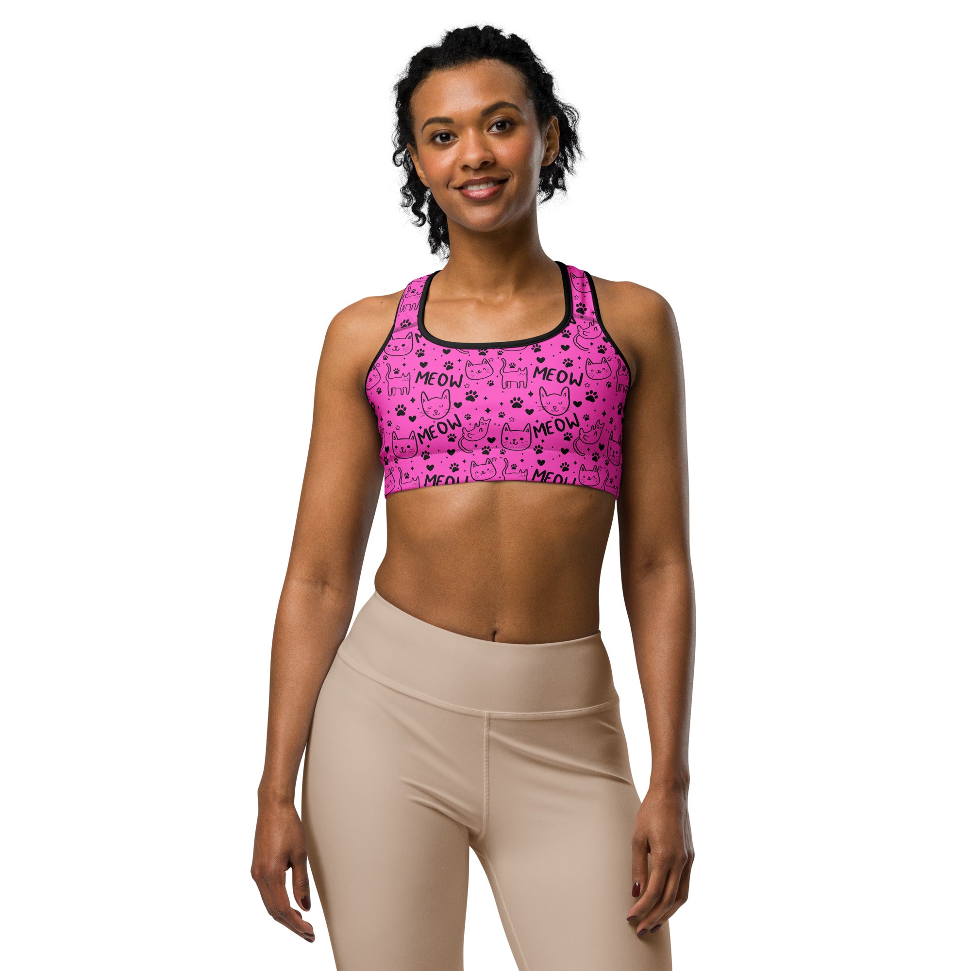 Pink and black Cat Meow print sports bra by Printful featuring all-over print design and supportive fit in XS-2XL sizes.