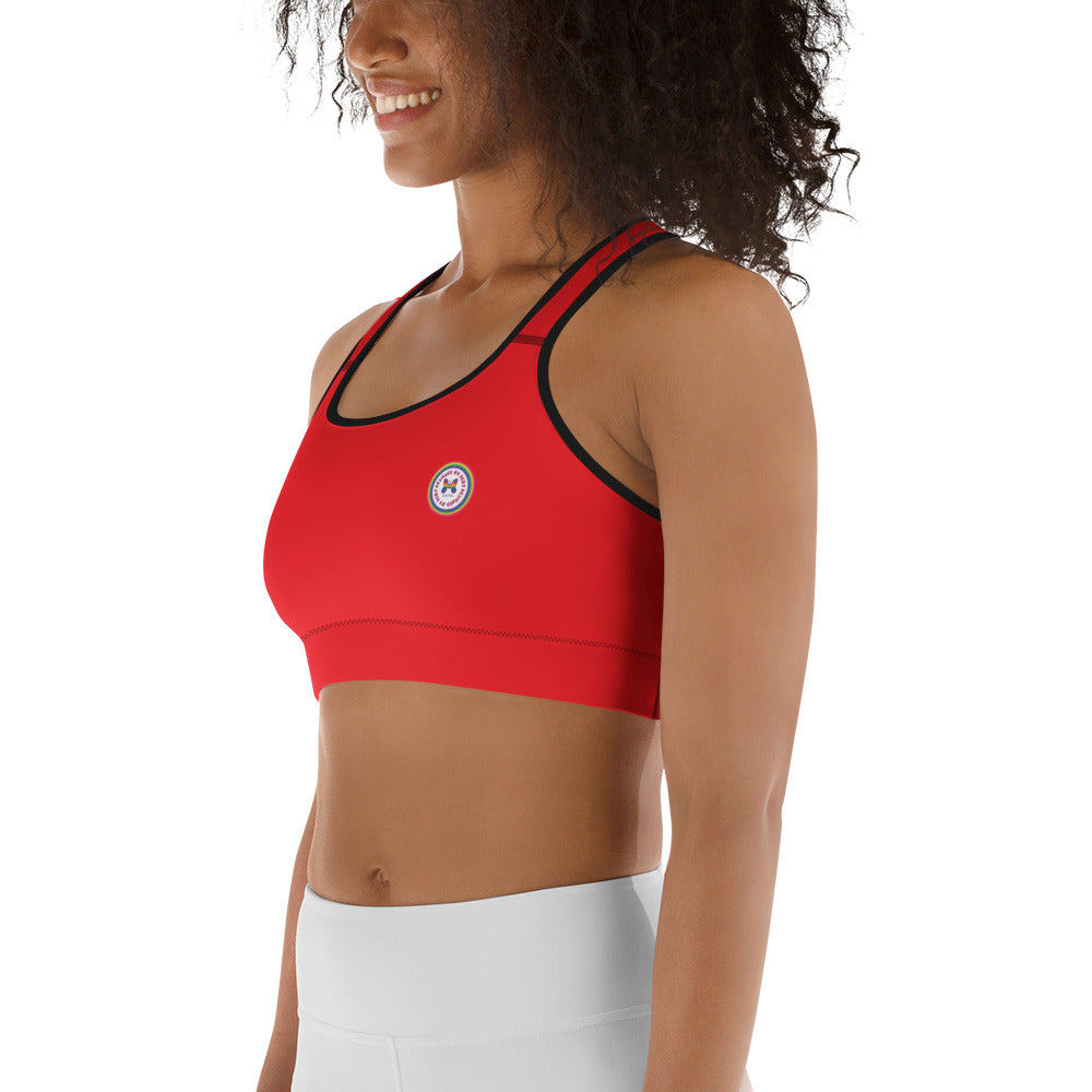 Red Printful sports bra with all-over black print, shown from the left side, available in XS to 2XL sizes.