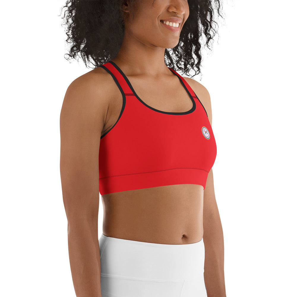 Red Printful sports bra with all-over black print design, shown from the right side, available in XS to 2XL sizes.
