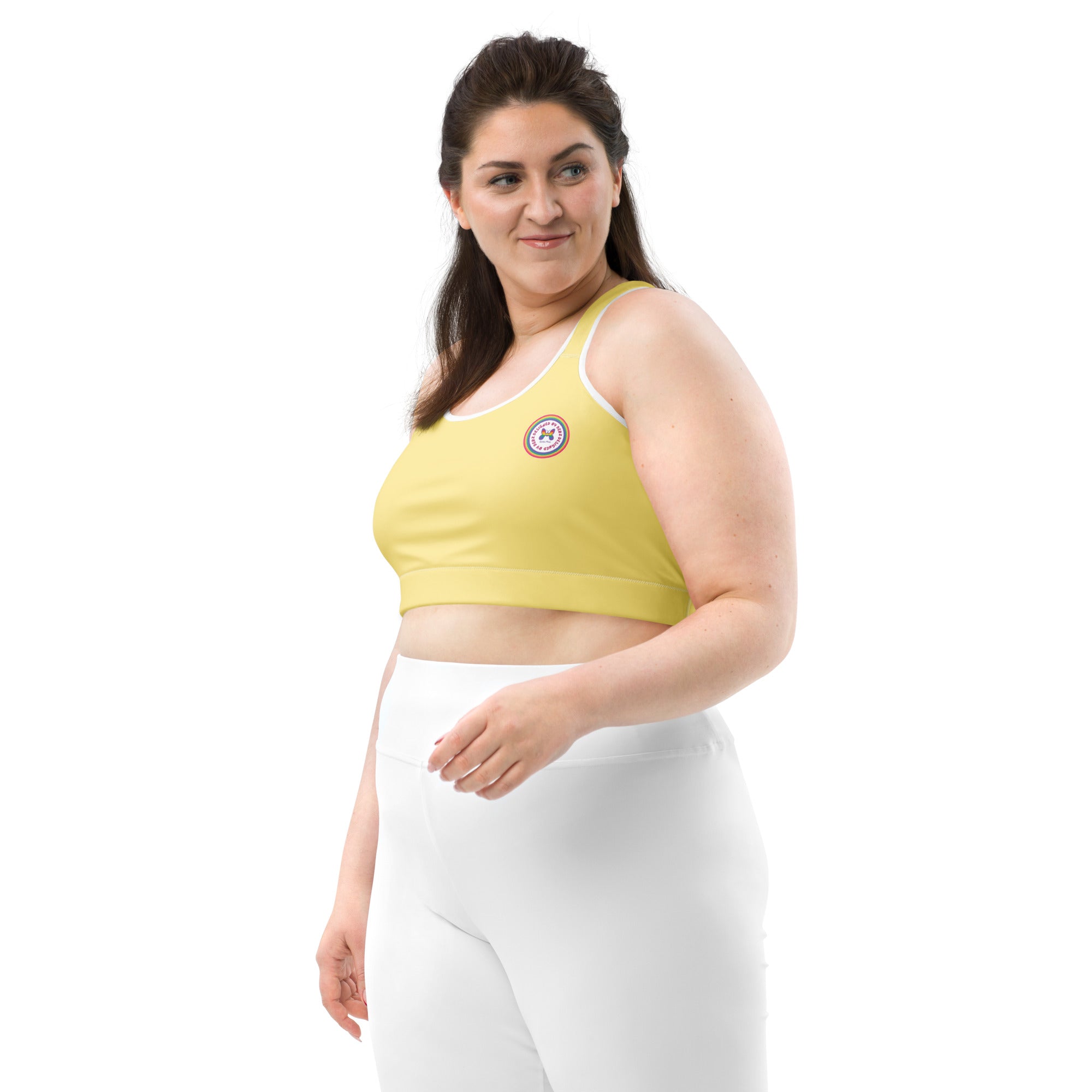 Printful yellow sports bra with white binding, all-over print, front view, available in XS to 2XL size.
