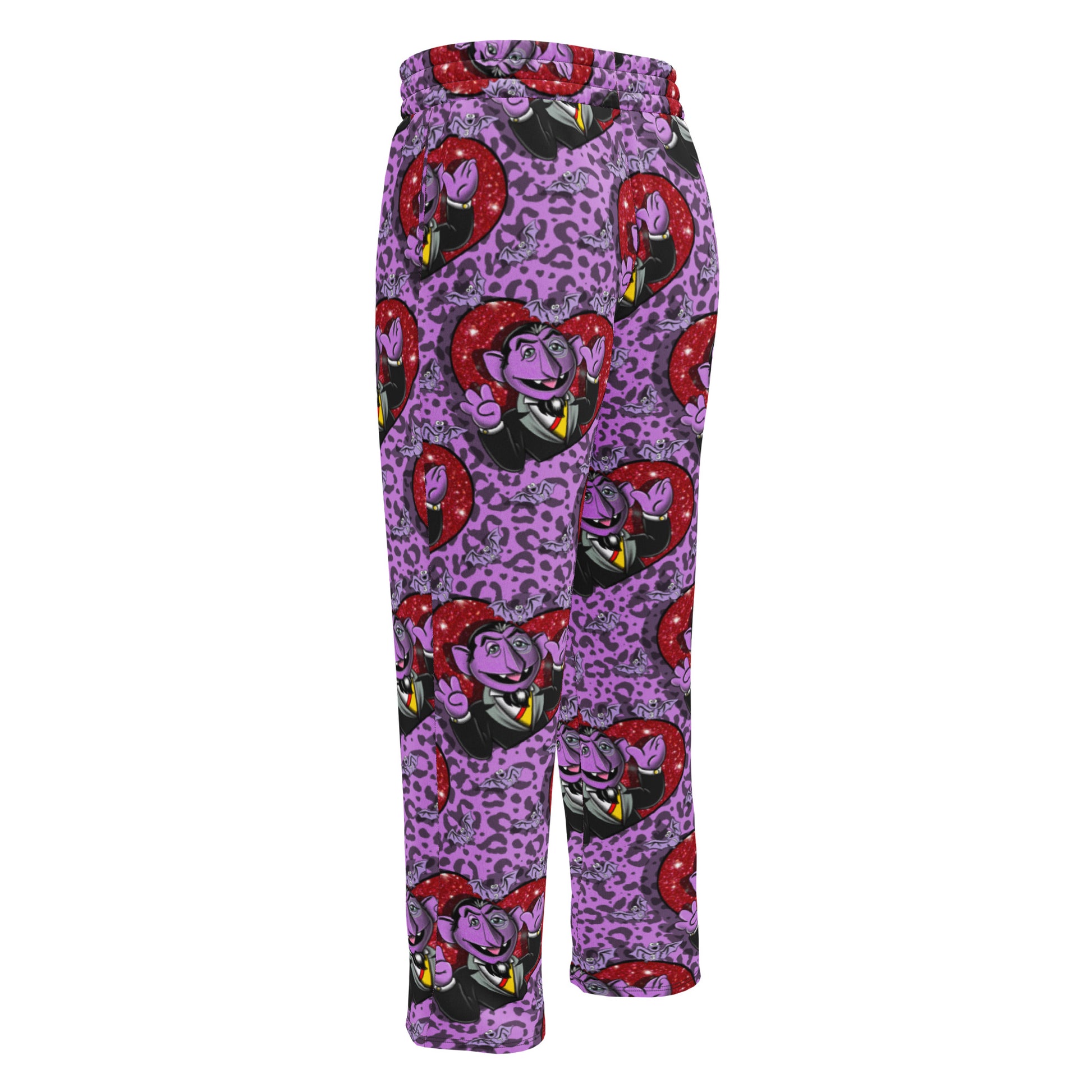 Unisex wide-leg joggers with all-over white print by Designed By Debz, featuring a relaxed fit and casual style.