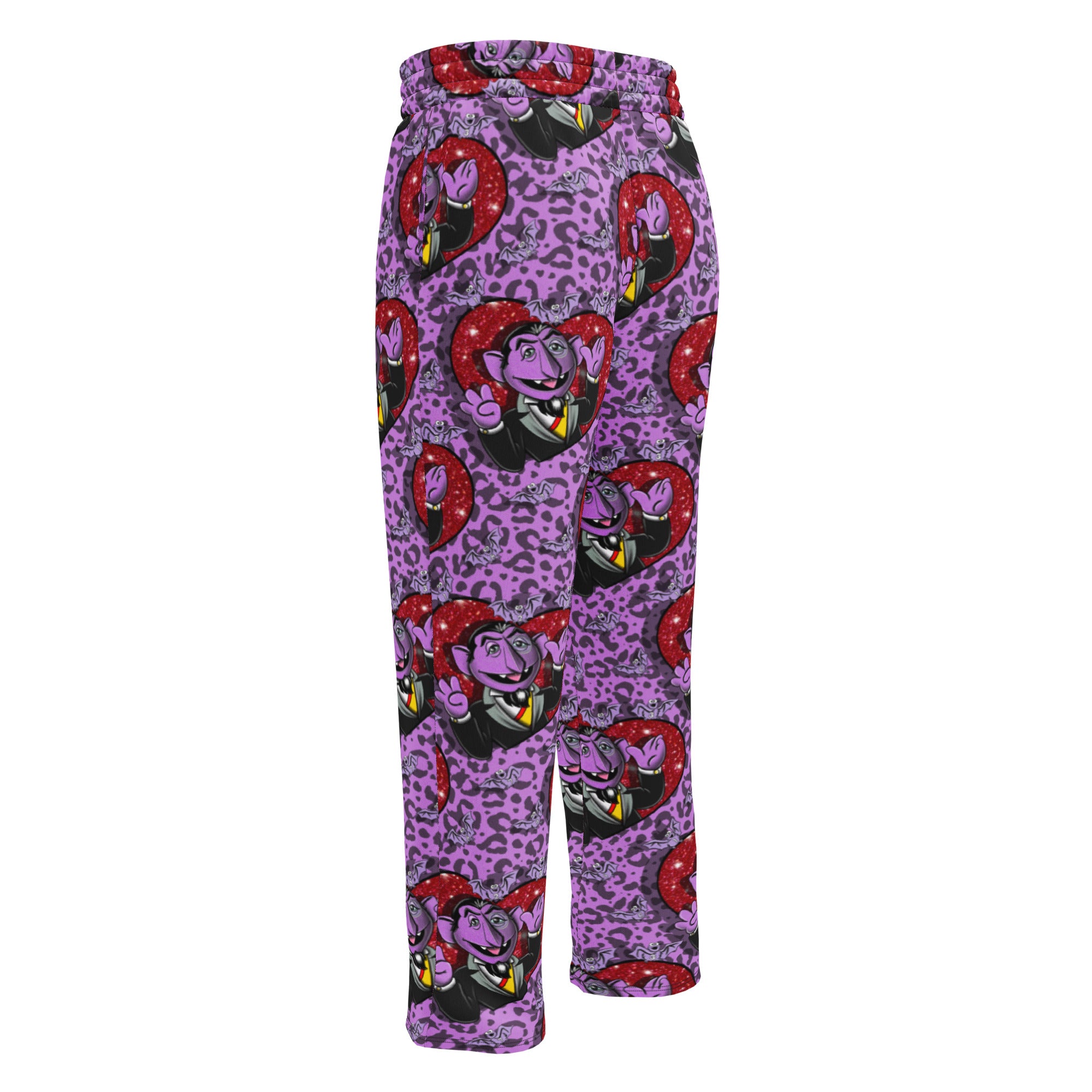 Unisex wide-leg joggers with all-over white print by Designed By Debz, featuring a relaxed fit and casual style.