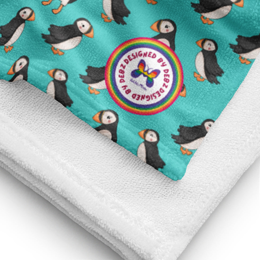 White Puffin Playtime beach towel, made to order, with colorful puffin design, 36x72 inches, ideal for beach or pool use.