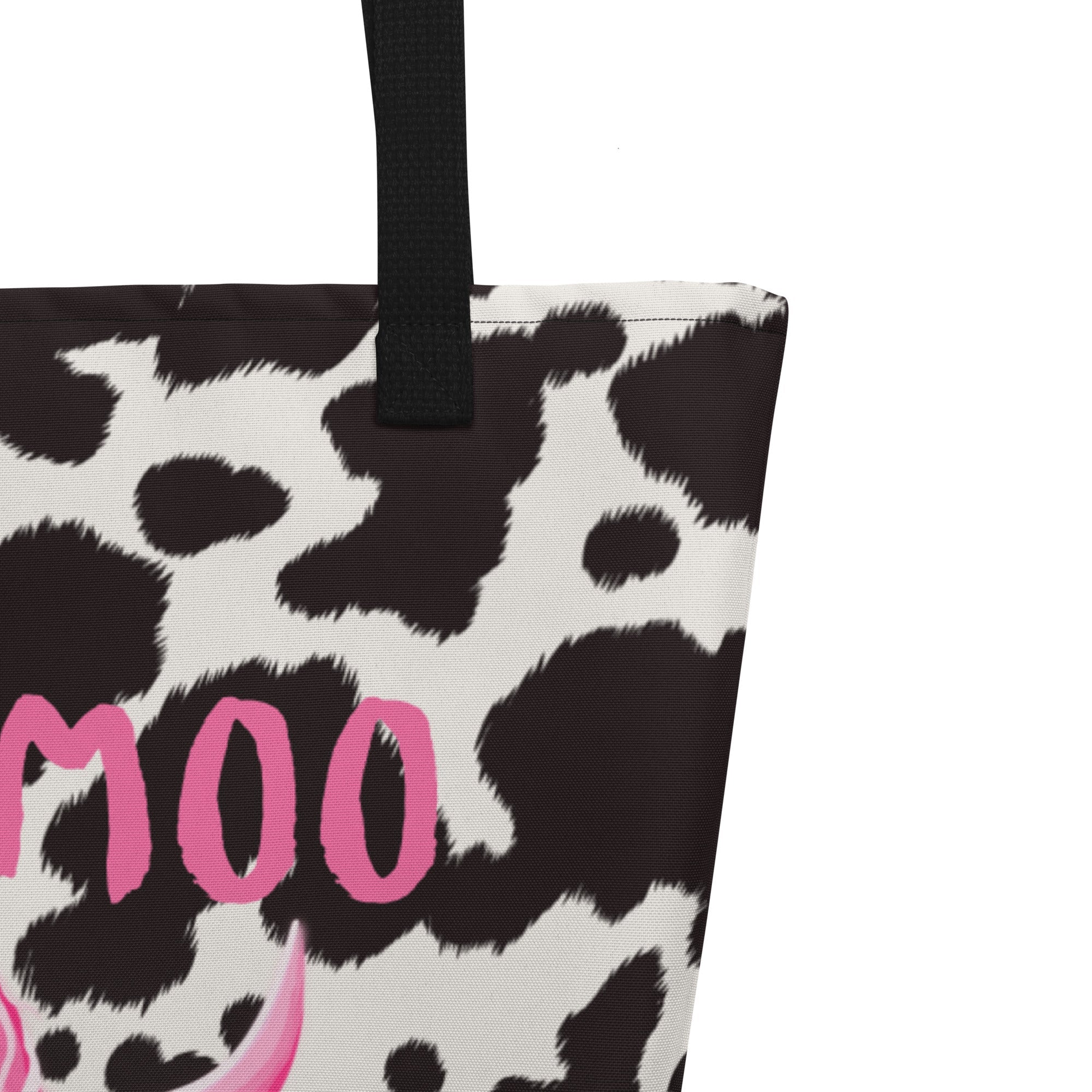 Black and white cow print tote bag by Designed By Debz, featuring a cute cow pattern and spacious shopper design.