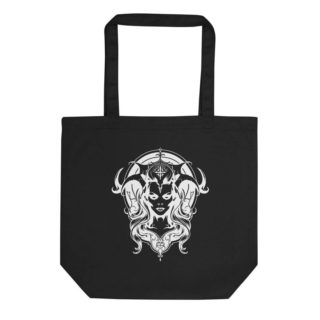 A black canvas tote bag with two black shoulder straps, featuring a large white graphic print of a horned female face with flowing hair on the front, set against a plain white background.