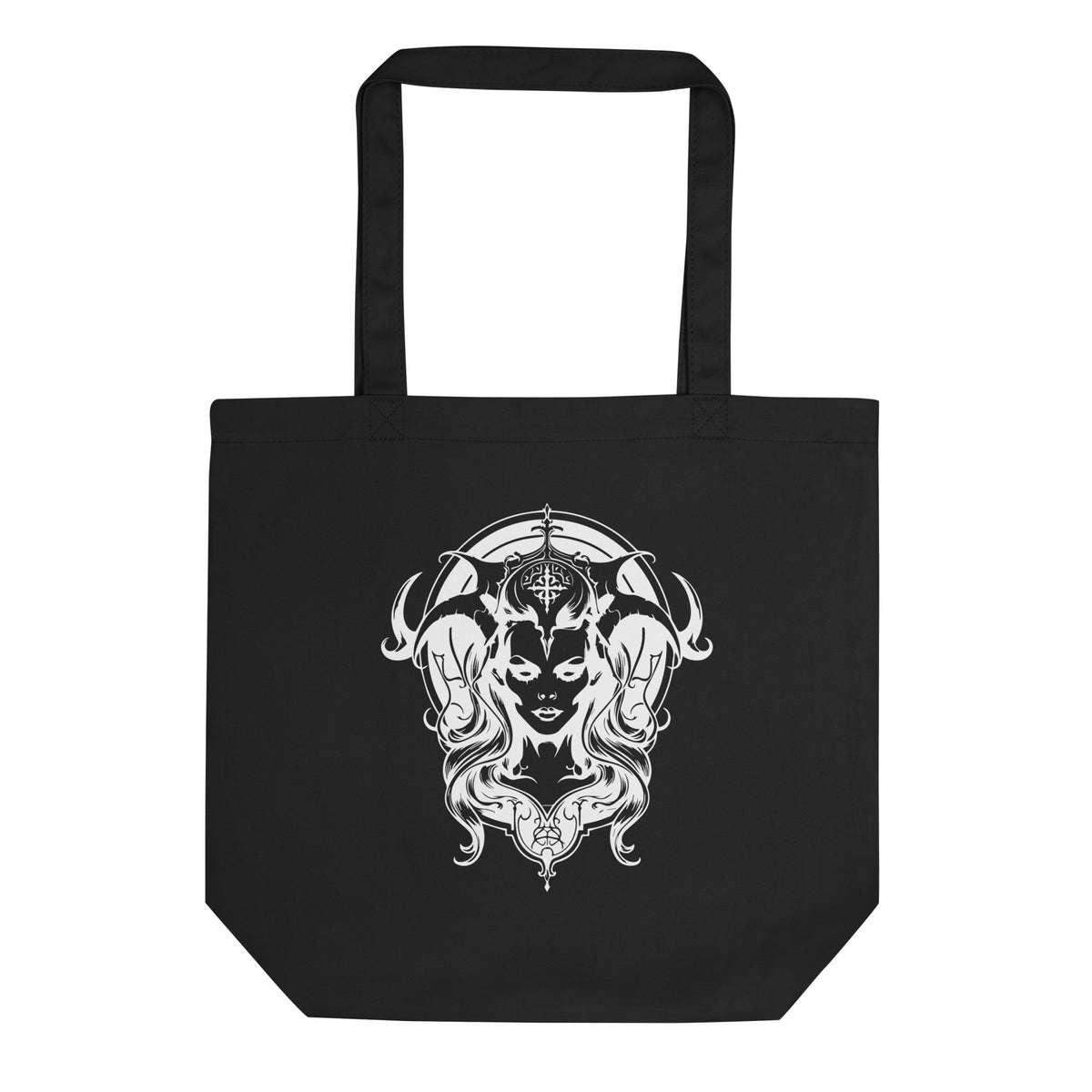 A black canvas tote bag with two black shoulder straps, featuring a large white graphic print of a horned female face with flowing hair on the front, set against a plain white background.