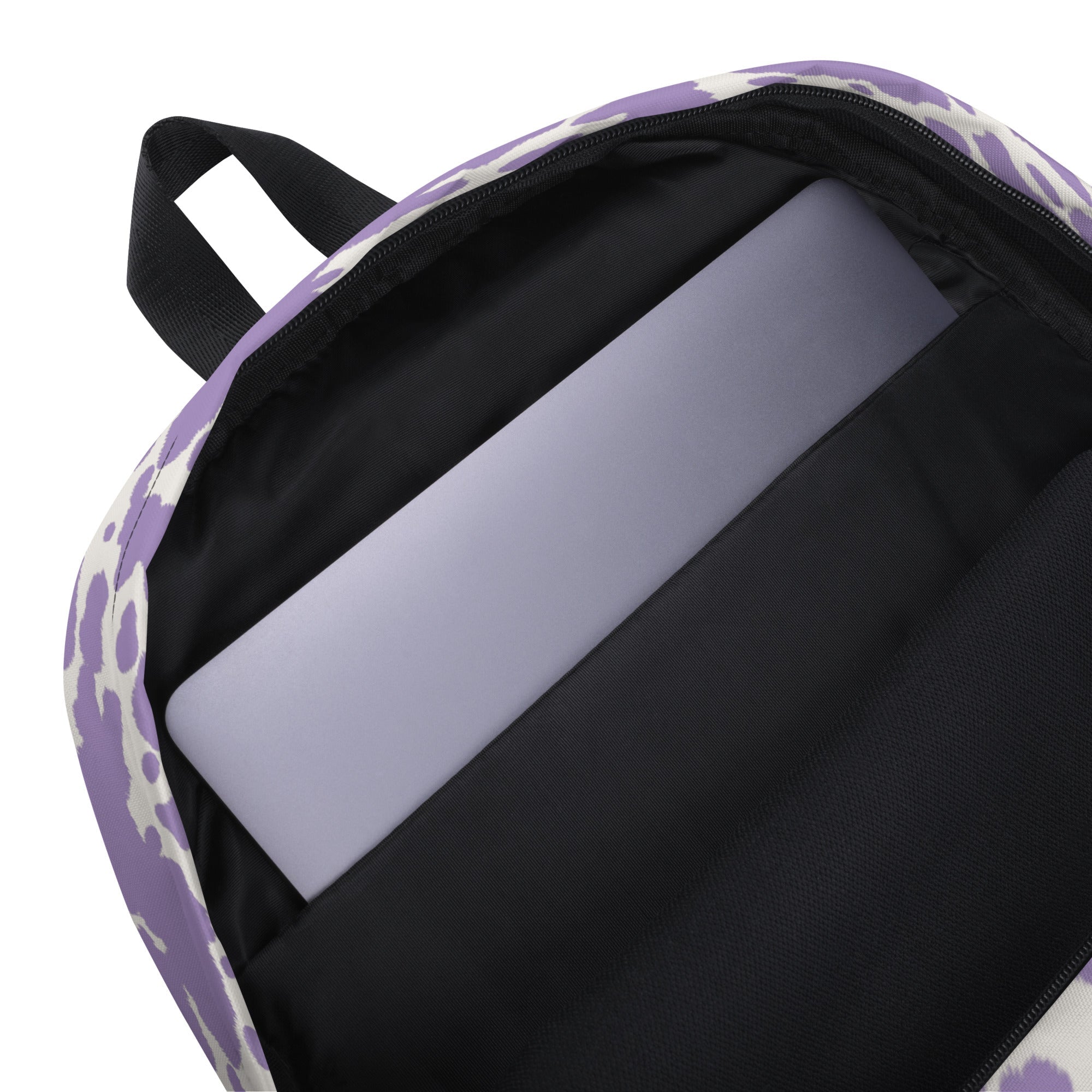 Lilac cow print backpack by Designed By Debz featuring a cute pink cow design, perfect for carrying laptops and everyday essentials.