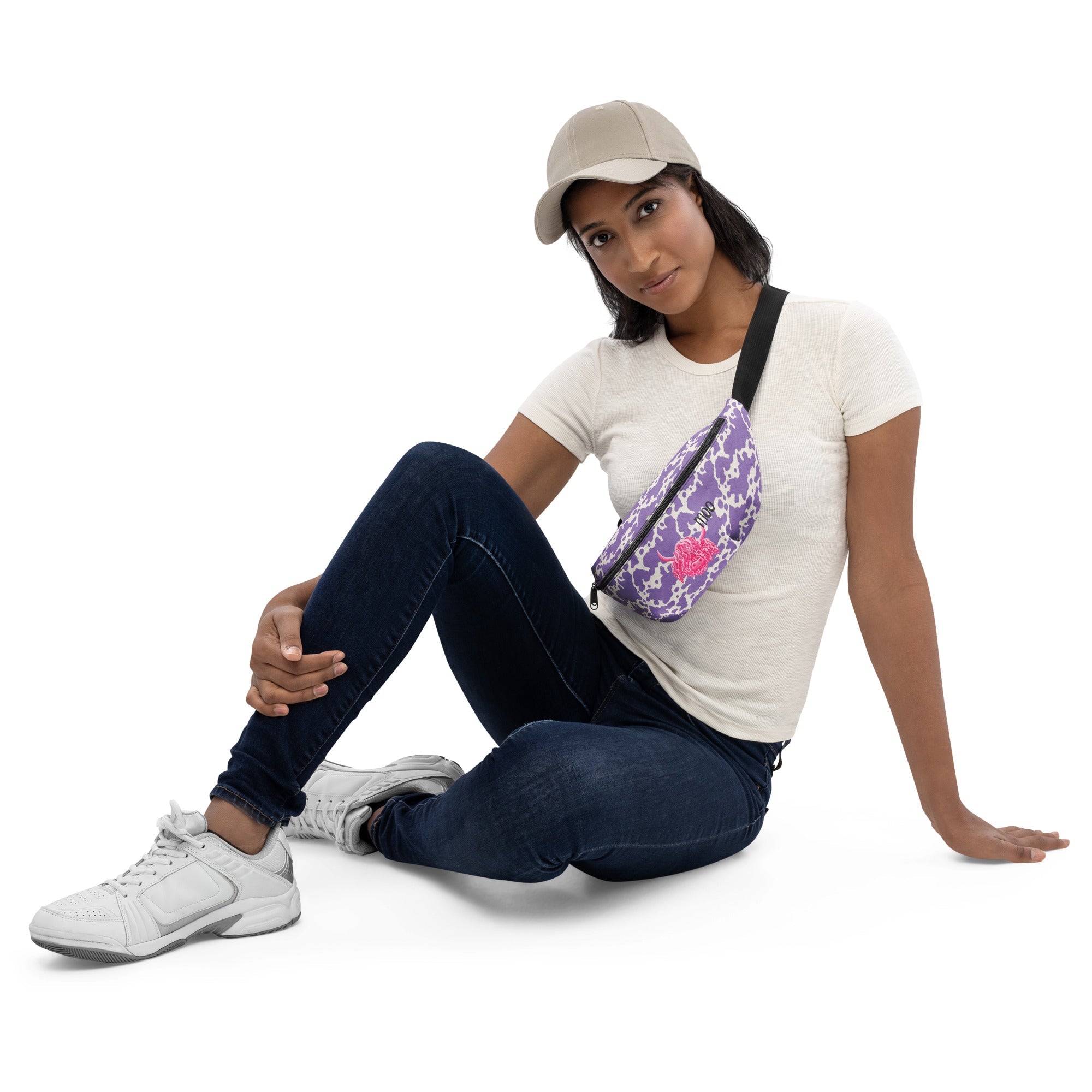 Lilac cow print bum bag by Printful featuring cute pink cow design, stylish fanny pack for casual outings.
