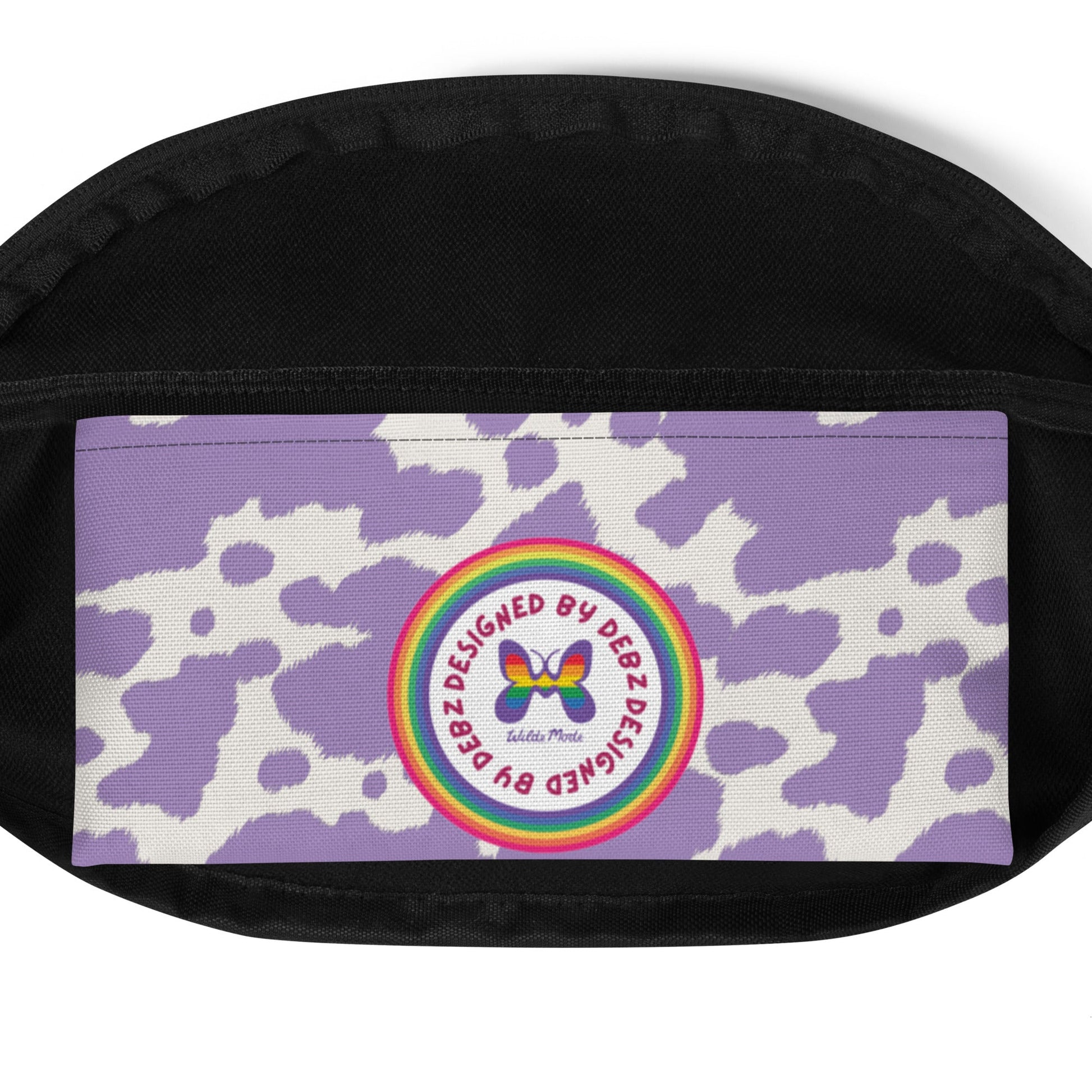 Pink cow print Bum Bag by Printful featuring lilac accents, cow pattern, and adjustable strap, perfect for casual wear.