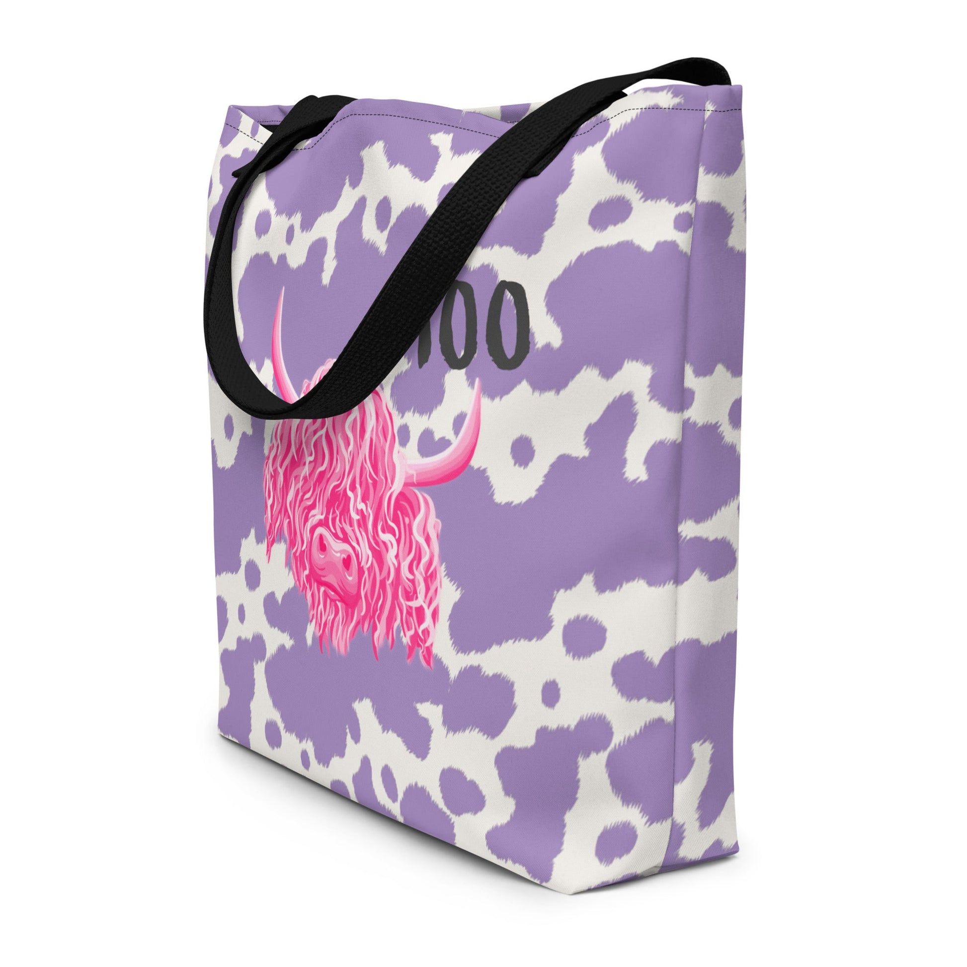 Lilac cow print tote bag by Printful featuring a cute pink cow design, perfect for casual shopping and everyday use.