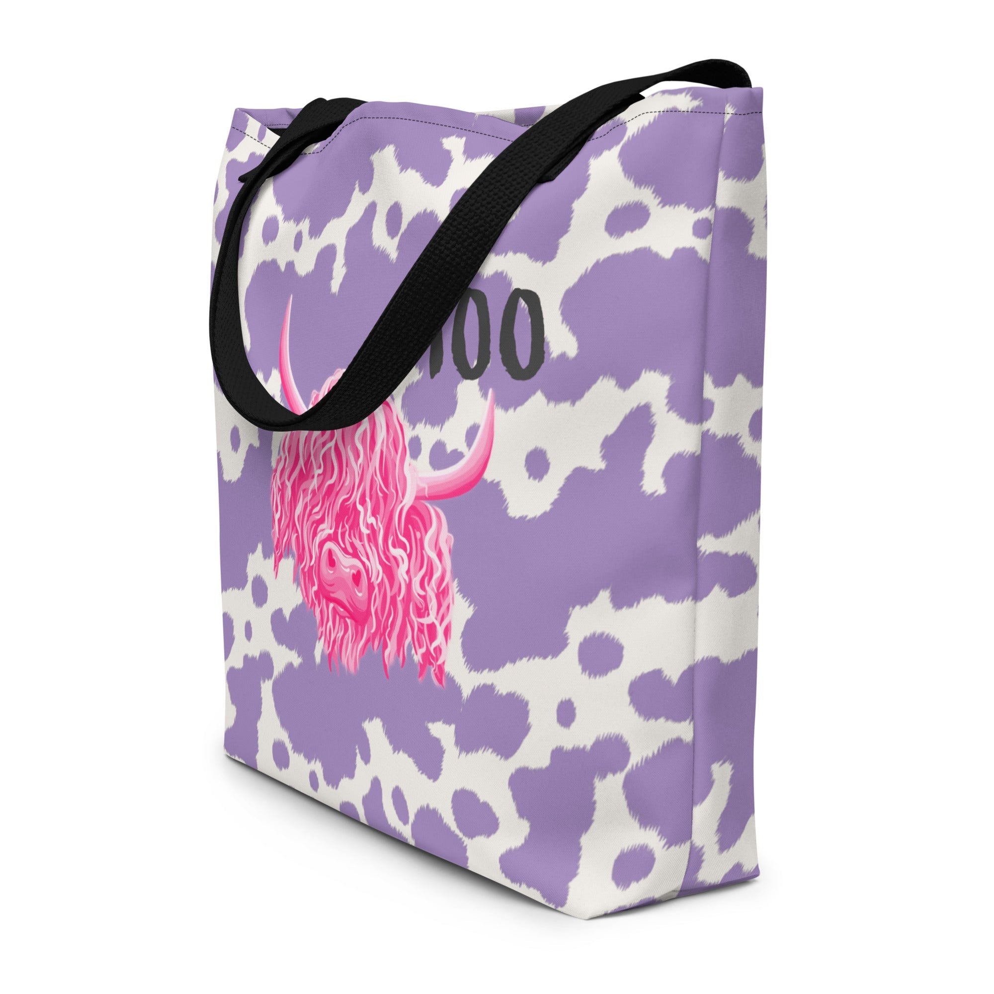 Lilac cow print tote bag by Printful featuring a cute pink cow design, perfect for casual shopping and everyday use.