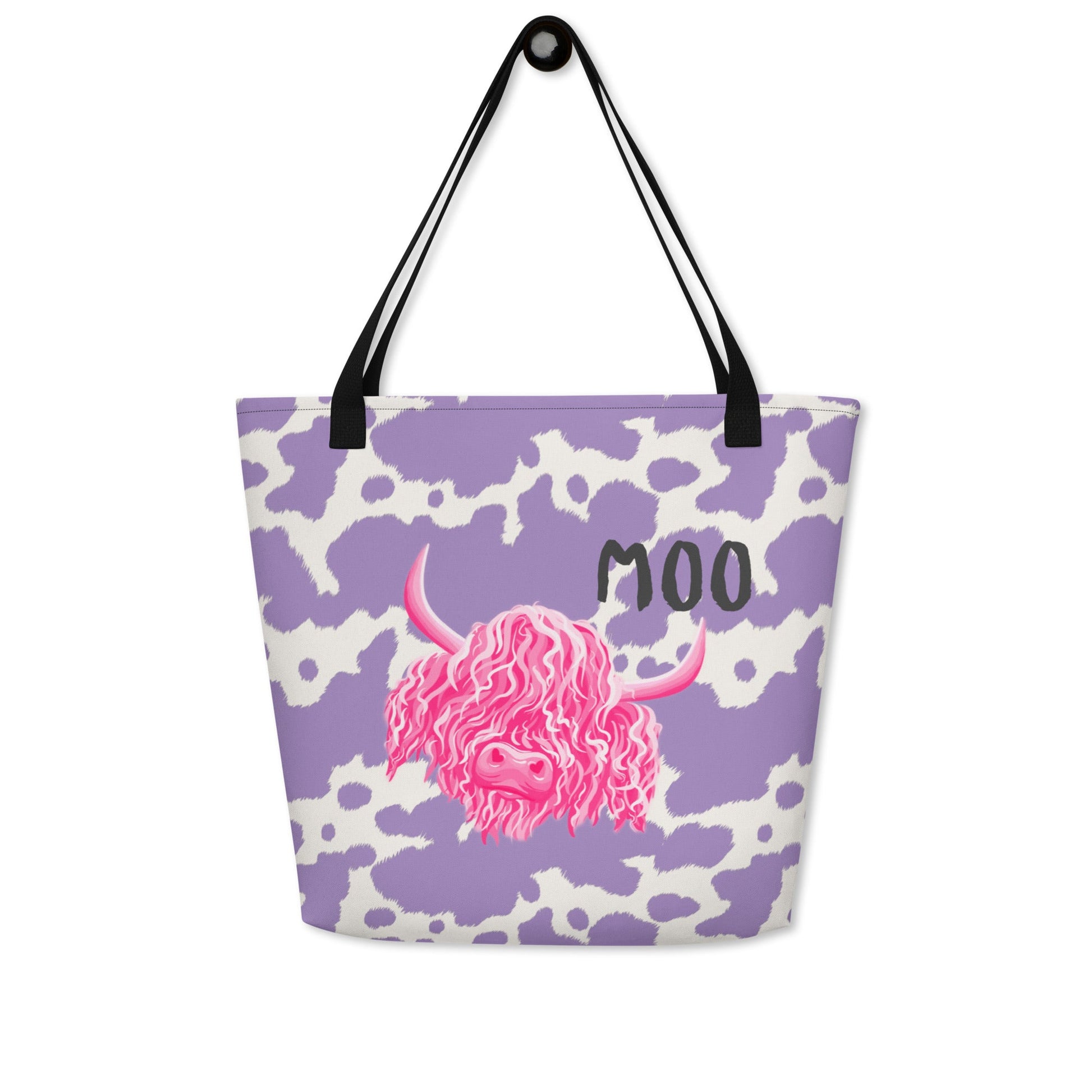Lilac cow print tote bag by Printful featuring a cute pink cow design, perfect for casual shopping and everyday use.