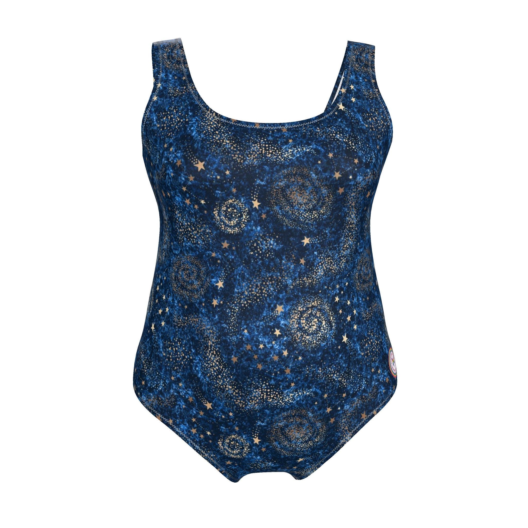A woman modeling a one-piece swimsuit with a dark blue and black celestial print featuring stars and swirls, set against a solid light blue background.