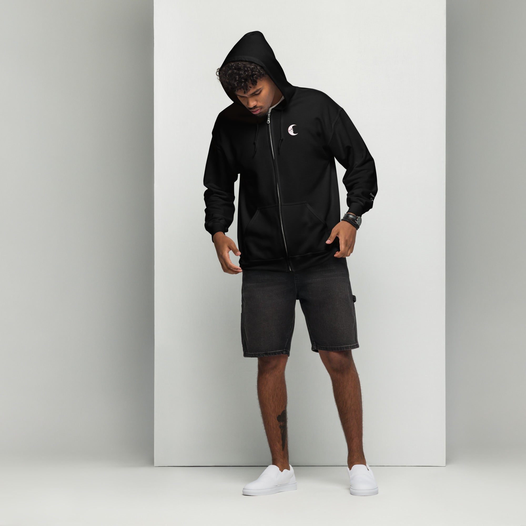 Black unisex zip hoodie with a Death Moon Skull graphic on the front, made by Printful, casual and stylish.