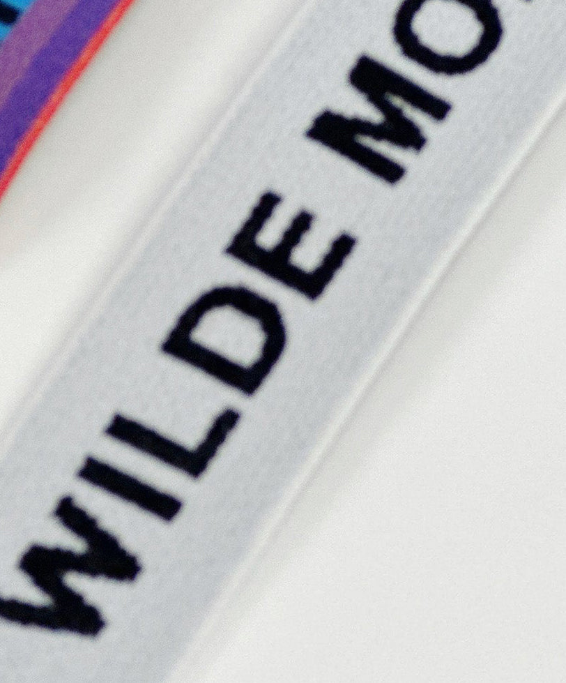 White adjustable slider strap for bras, designed by Debz, featuring a customizable fit for comfortable support and style.