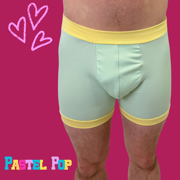 Pastel mint and yellow organic cotton boxer shorts from Designed By Debz Comfort Boxers, featuring a soft, breathable fabric.